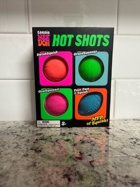 teenie NEE DOH Hot Shots Squishy Sports Balls - Pink, Green, Blue, Red